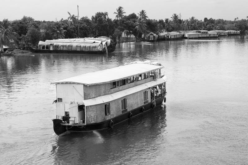 A houseboat in Pamba river, Alappuzha district, Kerala that drains into Vembanad Lake, causing water pollution